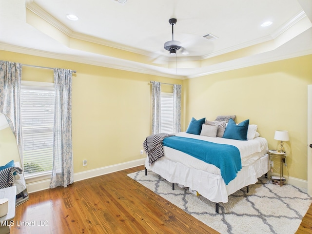 143 Charlton Dr, Madison, MS 39110 - bedroom with a raised ceiling, crown molding, wood finished floors, ceiling fan, and recessed lighting