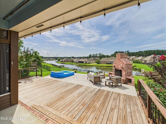 143 Charlton Dr, Madison, MS 39110 - wooden deck featuring a jacuzzi, a water view, a patio, a residential view, and an outdoor living space with a fireplace