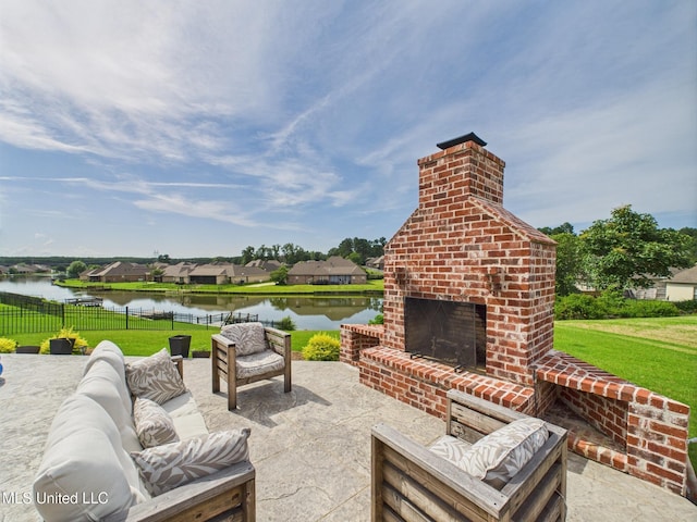 143 Charlton Dr, Madison, MS 39110 - view of patio / terrace featuring a water view and an outdoor living space with a fireplace