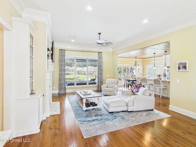 143 Charlton Dr, Madison, MS 39110 - living area featuring wood finished floors, recessed lighting, and crown molding