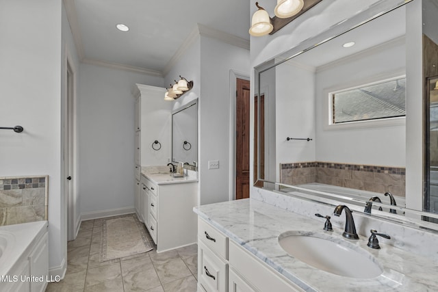 full bathroom featuring a garden tub, two vanities, a sink, and crown molding