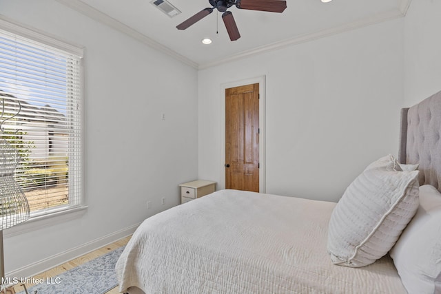 bedroom with recessed lighting, visible vents, baseboards, ornamental molding, and light wood-type flooring