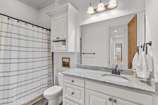 bathroom featuring toilet, ornamental molding, a shower with shower curtain, and vanity