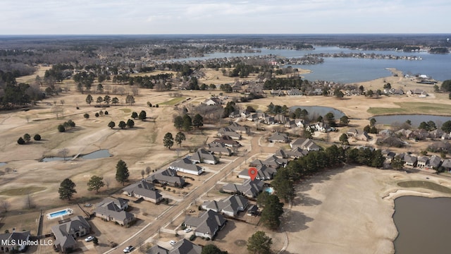 bird's eye view with a residential view and a water view