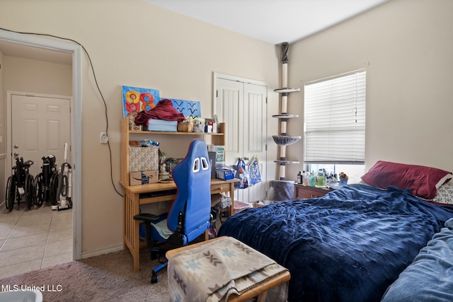 18496 Devin Ct, Gulfport, MS 39503 - carpeted bedroom with an office area, a closet, and tile patterned floors