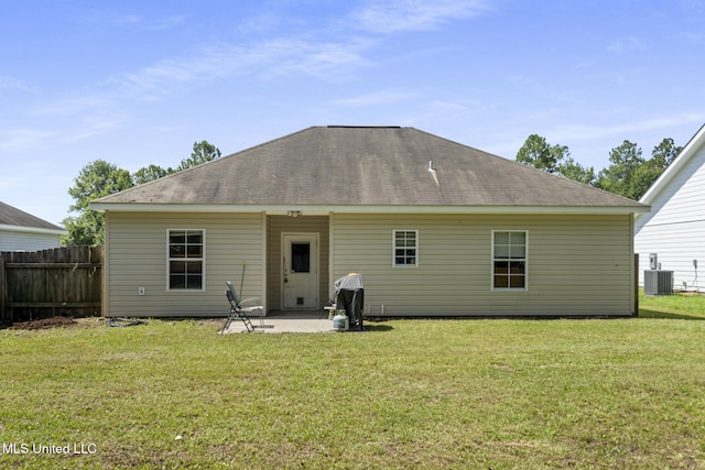 18496 Devin Ct, Gulfport, MS 39503 - rear view of property featuring roof with shingles and a patio