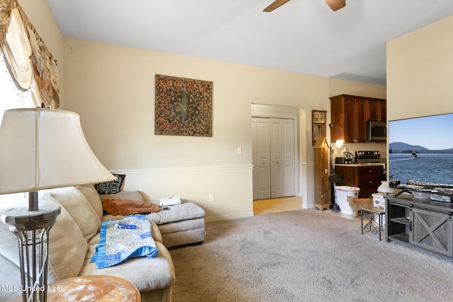 18496 Devin Ct, Gulfport, MS 39503 - living room with a ceiling fan and light carpet