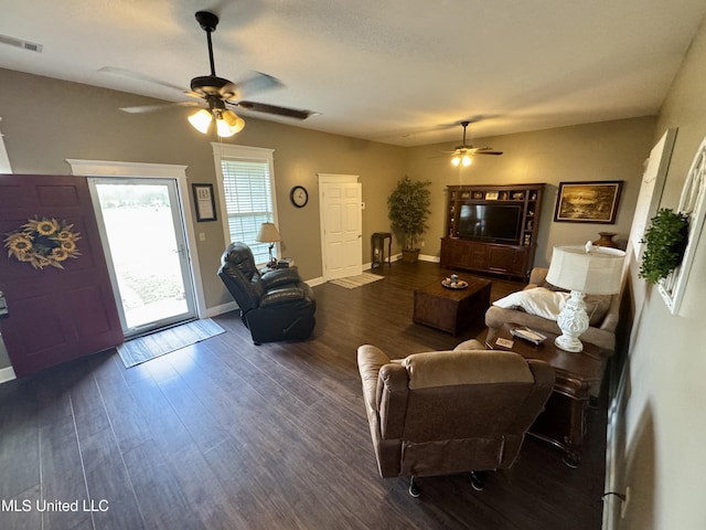 590 Eubanks Rd, Alligator, MS 38720 - living area featuring ceiling fan, dark wood-type flooring, and baseboards