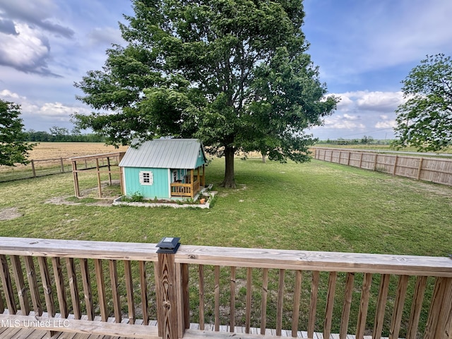590 Eubanks Rd, Alligator, MS 38720 - view of yard featuring a rural view, an outdoor structure, and a storage unit