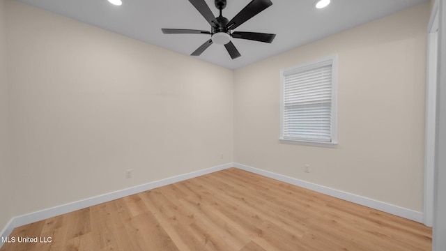 empty room with light wood-type flooring and ceiling fan