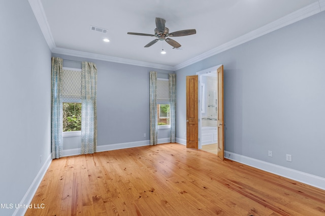 unfurnished room featuring crown molding, ceiling fan, light wood-type flooring, and a wealth of natural light