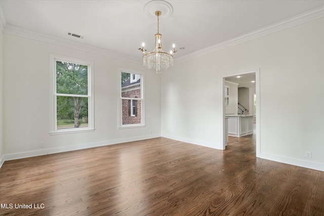 1594 Victoria Rd, Byhalia, MS 38611 - unfurnished dining area featuring a chandelier, crown molding, wood finished floors, and baseboards