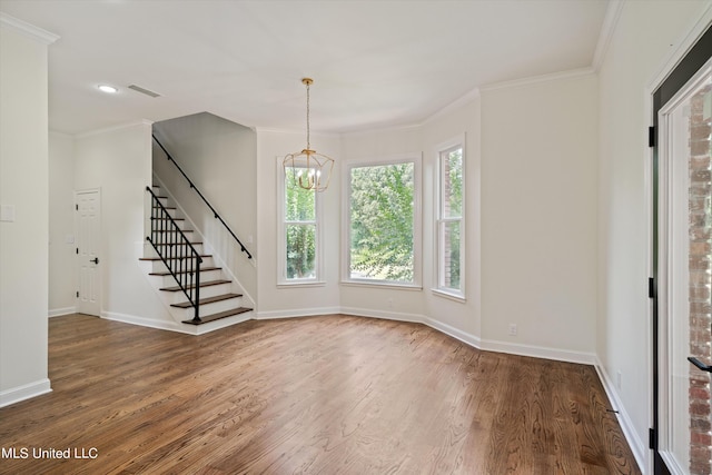 1594 Victoria Rd, Byhalia, MS 38611 - unfurnished living room featuring a chandelier, wood finished floors, stairway, baseboards, and ornamental molding