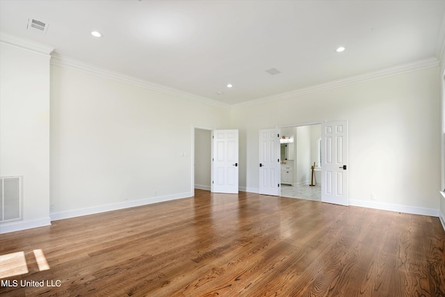 1594 Victoria Rd, Byhalia, MS 38611 - unfurnished room featuring ornamental molding, wood finished floors, baseboards, and recessed lighting