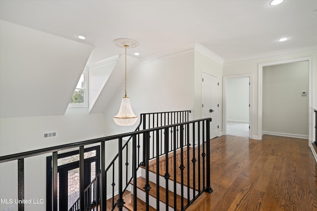 1594 Victoria Rd, Byhalia, MS 38611 - hallway with an upstairs landing, recessed lighting, wood finished floors, crown molding, and baseboards