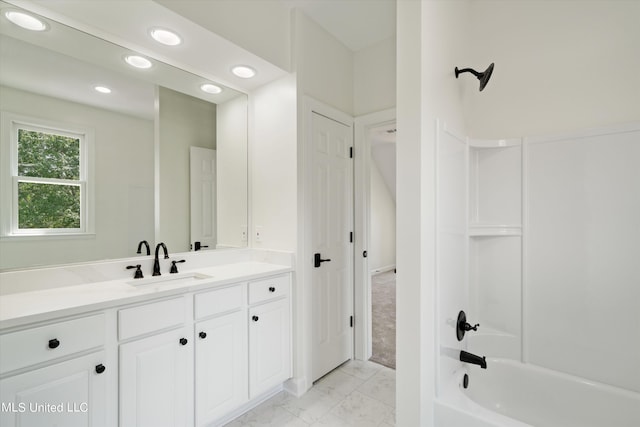1594 Victoria Rd, Byhalia, MS 38611 - full bath with marble look tile flooring, shower / washtub combination, vanity, and recessed lighting