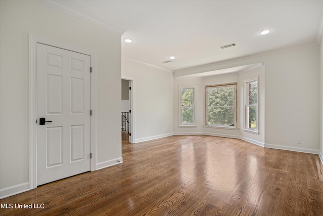1594 Victoria Rd, Byhalia, MS 38611 - unfurnished living room with wood finished floors, ornamental molding, baseboards, and recessed lighting