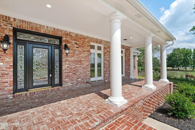 1594 Victoria Rd, Byhalia, MS 38611 - view of patio featuring a porch