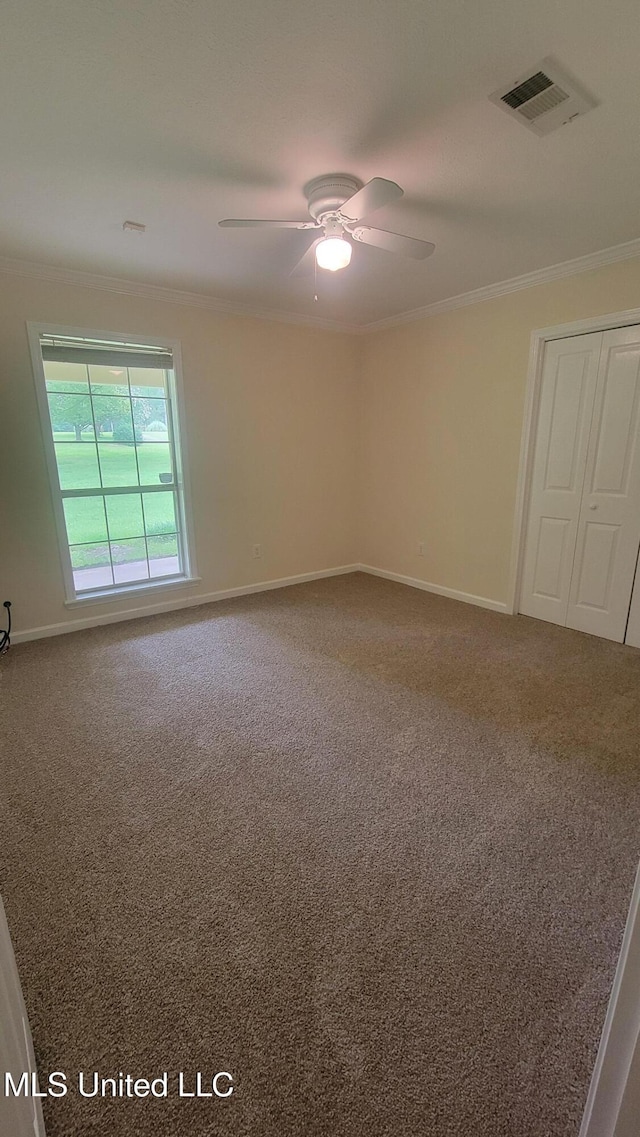 2257 Boyd Rd, Utica, MS 39175 - carpeted empty room featuring ornamental molding, baseboards, and ceiling fan