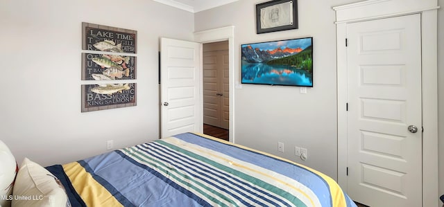 bedroom featuring ornamental molding