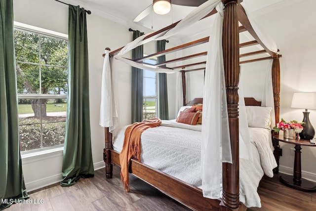111 Jefferson Davis Pkwy, Picayune, MS 39466 - bedroom featuring crown molding, baseboards, and wood finished floors