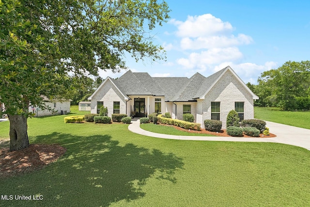 111 Jefferson Davis Pkwy, Picayune, MS 39466 - view of front of house with a front lawn and brick siding