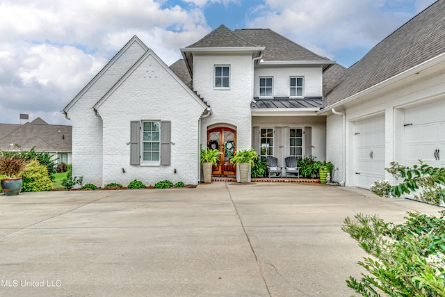 view of front of property featuring a garage