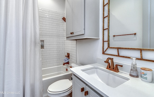 full bathroom featuring toilet, vanity, and shower / bath combination with curtain