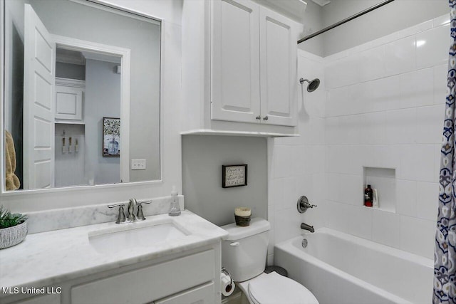 full bath with toilet, shower / bath combination with curtain, and vanity