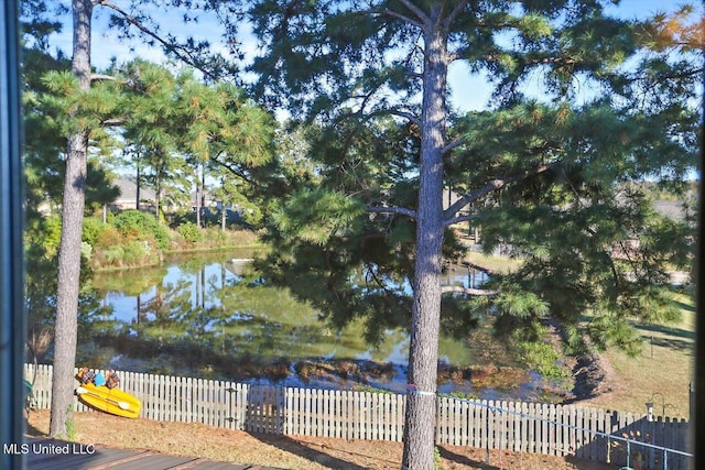 property view of water with fence