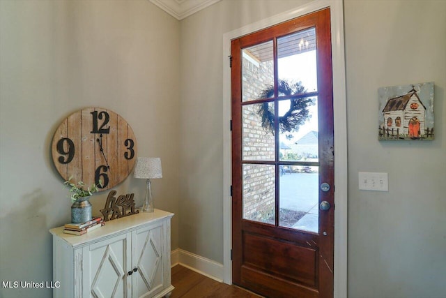 doorway to outside with dark wood-style flooring and baseboards