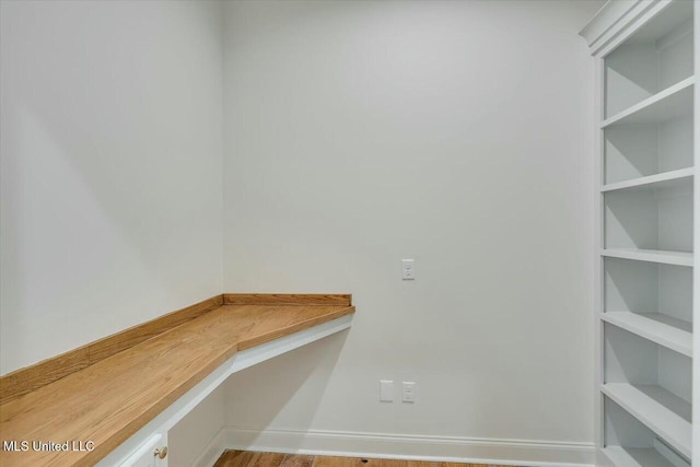 walk in closet with built in study area