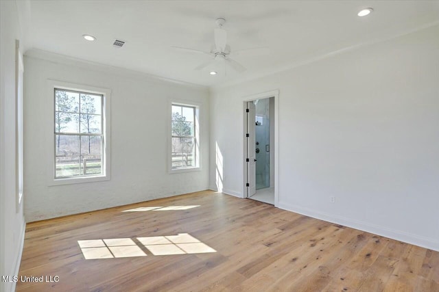 unfurnished room with recessed lighting, visible vents, light wood-style floors, a ceiling fan, and baseboards