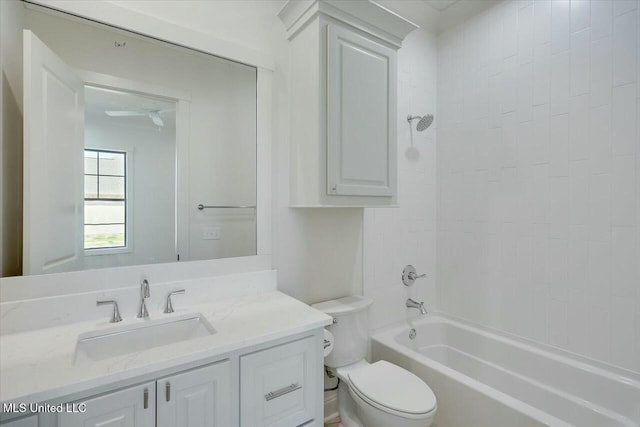 full bath with shower / bath combination, vanity, and toilet