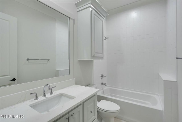 full bath with  shower combination, vanity, and toilet