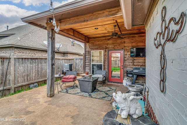 view of patio / terrace featuring area for grilling and ceiling fan