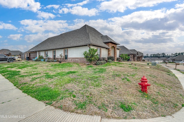 view of side of property featuring a garage