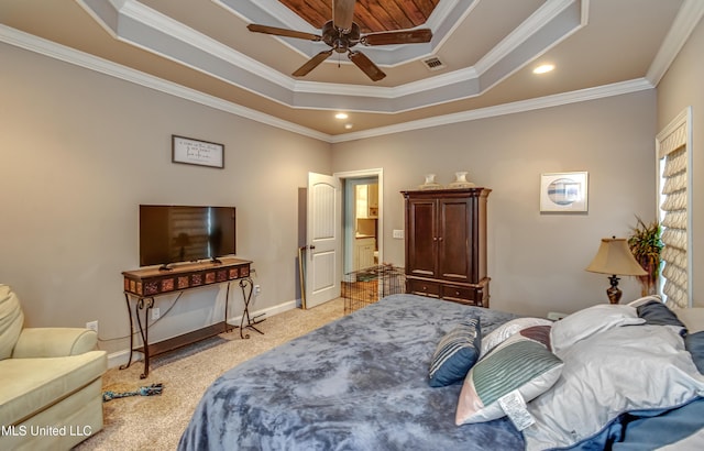 carpeted bedroom with a raised ceiling, crown molding, and ceiling fan