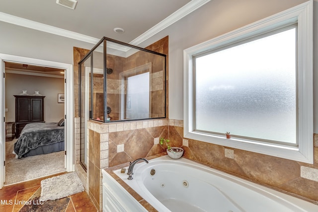 bathroom with crown molding and independent shower and bath