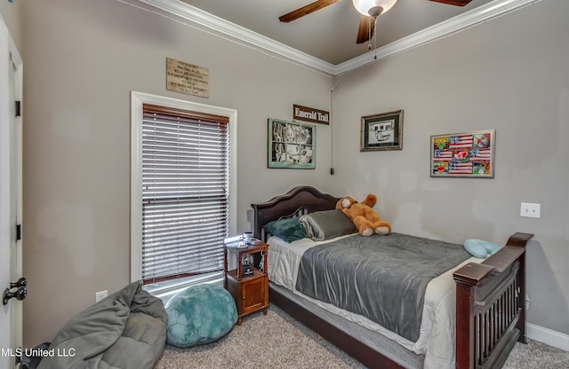 bedroom featuring ceiling fan, light colored carpet, and ornamental molding