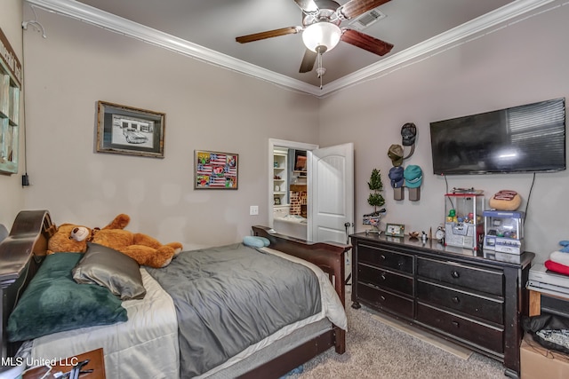 bedroom featuring crown molding, light colored carpet, and ceiling fan