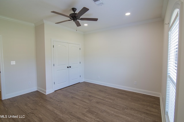 163 Frye Cir, Caledonia, MS 39740 - unfurnished bedroom featuring dark wood finished floors, baseboards, recessed lighting, crown molding, and a closet