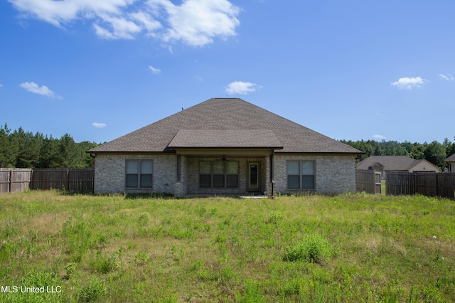 163 Frye Cir, Caledonia, MS 39740 - rear view of house featuring brick siding, a ceiling fan, and a shingled roof