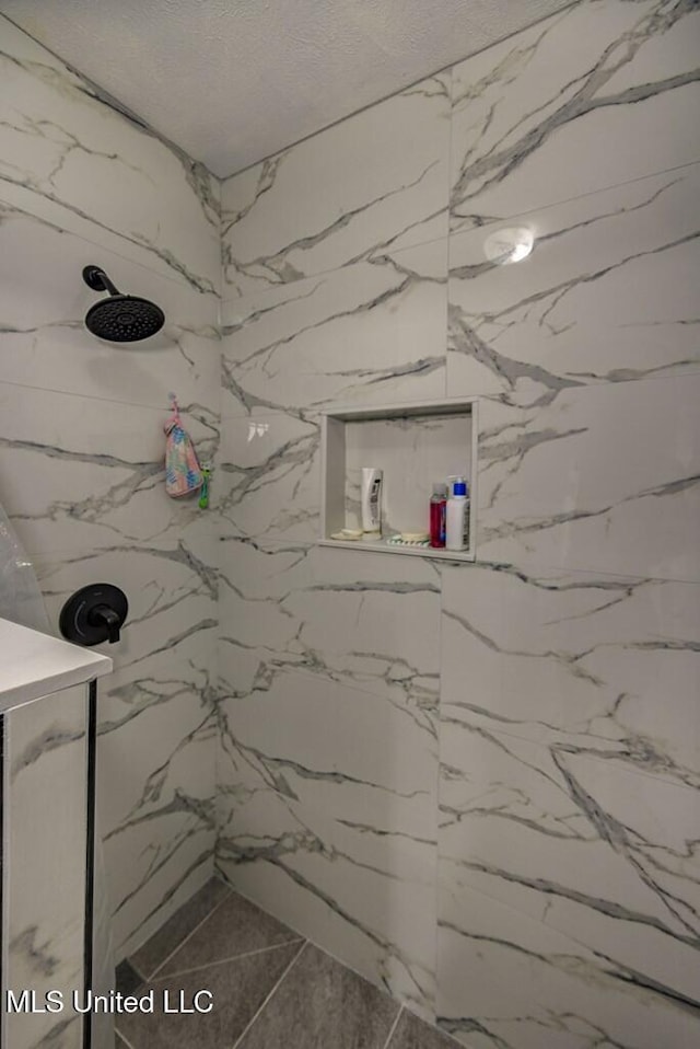 5285 Williamson Rd, Clinton, MS 39056 - full bathroom with a marble finish shower
