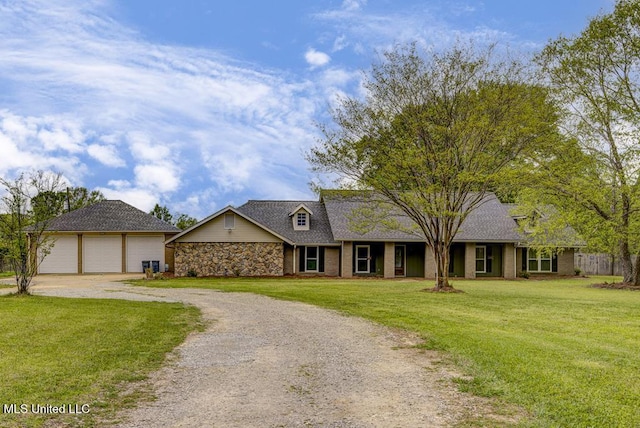 5285 Williamson Rd, Clinton, MS 39056 - view of front facade with driveway, a front lawn, and a garage