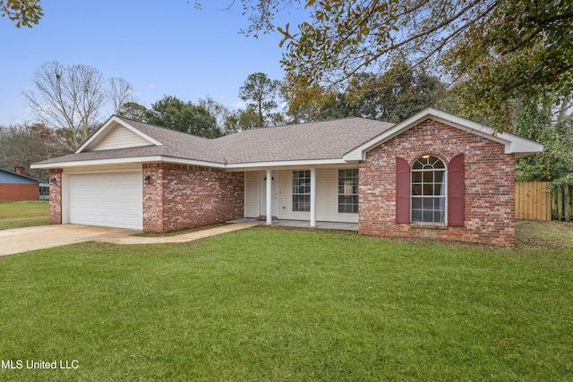 ranch-style home featuring a front yard, a porch, and a garage