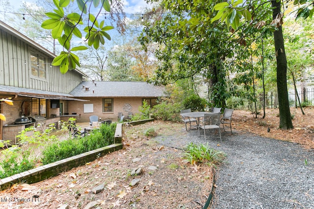 view of yard with a patio area