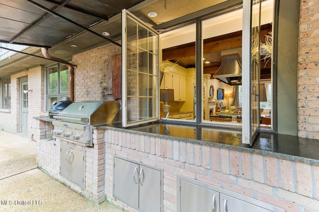 view of patio with area for grilling