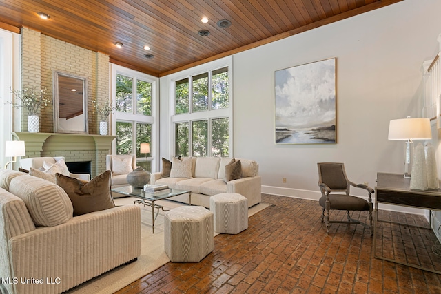 living room with a towering ceiling, wooden ceiling, and a fireplace