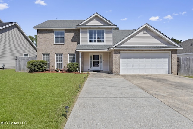 11222 Cypress Bayou Dr, Gulfport, MS 39503 - view of front of house with a front yard, a garage, brick siding, concrete driveway, and fence
